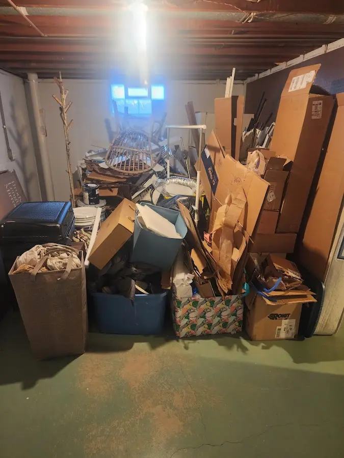 Roll-off dumpster container at job site for 2 Yard Dumpster Rental in Neosho